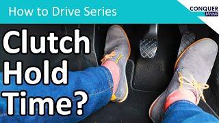 How long should you hold the clutch at the bite point when driving a manual car.