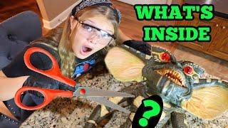 WHATS INSIDE the GREMLIN? CUTTING OPEN a GREMLIN w/ Aubrey & Caleb!