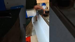 Pneumatic hole punch to create an expansion slot in Jamb metal