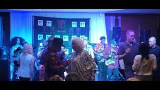 The Hip Huggers sings "Feel That You're Feelin" at The Blue Dolphin Bar and Seafood Grill.