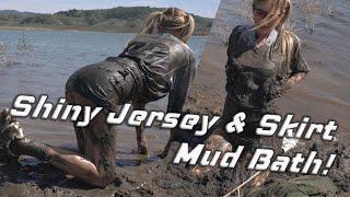 Muddy Wetlook Girl Wearing Shiny Jersey & Leather Skirt, Down Jacket, Having Fun Mud Bath | WAM