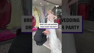 Cutting my wedding dress on the day 