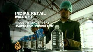 India drops plans to open up retail market