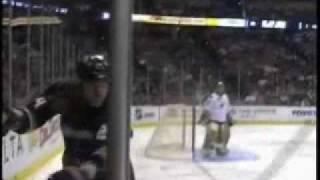 Brad May hammers Sergei Zubov