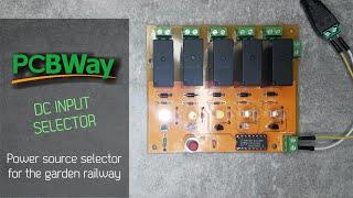 DC input selector for garden trains