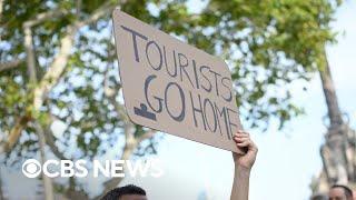 Why Barcelona locals are protesting tourists