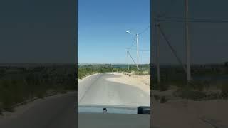 Казахстан. Город Кунаев (Капчагай). Июль 2022. Дорога га пляж Голубой залив, песчаная коса.