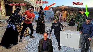 The husband's attempt to throw out the second wife and protect Zahra