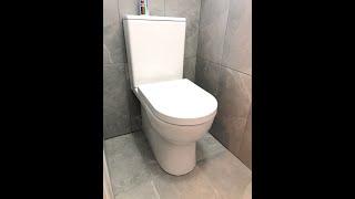 Rimless toilet installation, back to wall