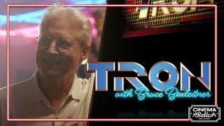 Tron costume reunites with Bruce Boxleitner in a video arcade