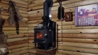 Cubic mini wood stove in Grandpa's tiny cabin