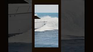 Classic yacht splashing at the Haulover Inlet