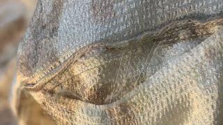 Teach yourself how to beautifully repair a hole in your clothes with just a needle and thread.