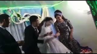 The Uzbek groom punches the bride on their wedding day