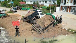 Amazing Dump Trucks Overloading Update PROJECT!! Landfill In The pond into trash filled swamp.