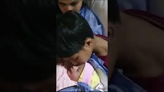 new born sister kissing brother like and subscribe