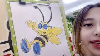 The kindergarten teacher instructs to color a picture of a yellow bee