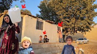 Khadija worked hard to cover the front of the hut with white cement to build a beautiful hut.