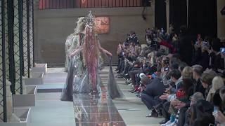 Model Irina Kravchenko gets stuck on the catwalk at Guo Pei Couture Spring 2017