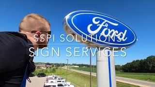 SSPI Solutions Sign Service Technician in Action