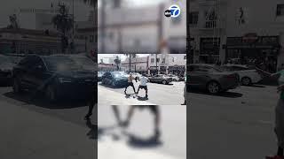 Bystanders subdue man who exposed himself to Hollywood traffic, tourists