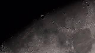 Moon through a telescope. The Apennine Mountains.