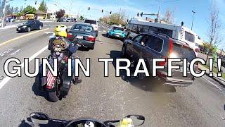 Biker Pulls Gun in Traffic!