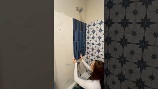 Peel and stick tiling the shower  #bathroomdesign #homedecor