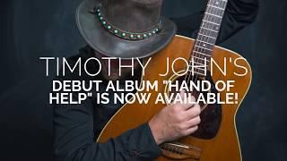 "Hand of Help" by Timothy John featuring acoustic folk ballads and love songs is now available!