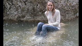 Wetlook - Elaine in river under the rain (Adidas, jeans and sweater)