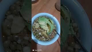 Eating special avocado,with pigeon peas, MercyNguku The Global Traveller 