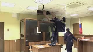 Russian trying to escape from court room