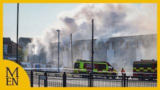 Fire crews spend second day at huge Middleton storage unit fire