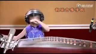 Girl plays instrument very good