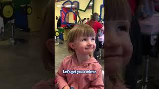 Fearless toddler's wholesome reaction to ear piercing