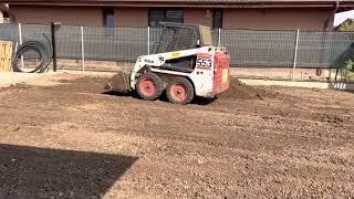 Soil grading With bobcat 553