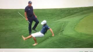 Billy Horschel slips and slides down the hill at The Masters...