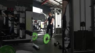 Execute a superset of biceps curls using an EZ bar, immediately followed by rope triceps pushdowns.