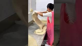 Incredible Dough Stretching Technique: Watch This!