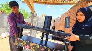 "Order and Beauty: Moving the TV and Using Pallets to Decorate the Porch"
