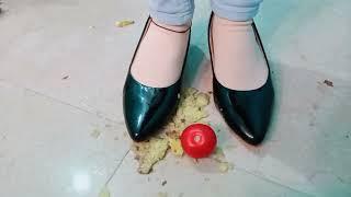 Potato Apple and Tomato crushing with black high heels