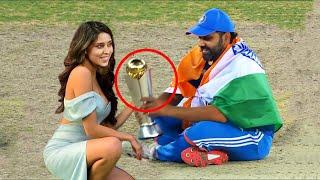 Rohit Sharma and Ritika emotional sitting on the pitch after winning the Champions Trophy