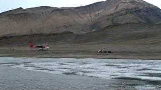 Twin Otter landing in the arctic island of Axel Heiberg