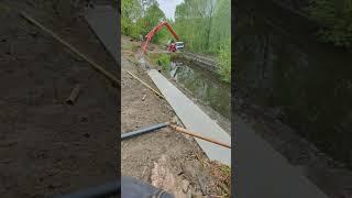 Building Retaining Walls with Giant Concrete Lego Blocks