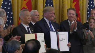 Trump, Liu He sign 'phase one' of the US-China trade deal | AFP