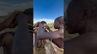 Hadzabe Tribe bushmen Chabba try modern sunglasses for the first time ever 