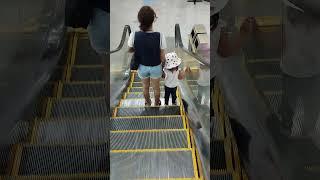 this little cutie always curious the thing she touch#staircases #groove#escalator #viral #shorts
