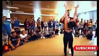 Watch this couple in a romantic Latin dance performance.
