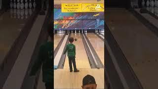 Kid makes impossible bowling trick shot look easy!