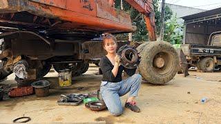 Genius girl replaces rear wheel bearings for excavator